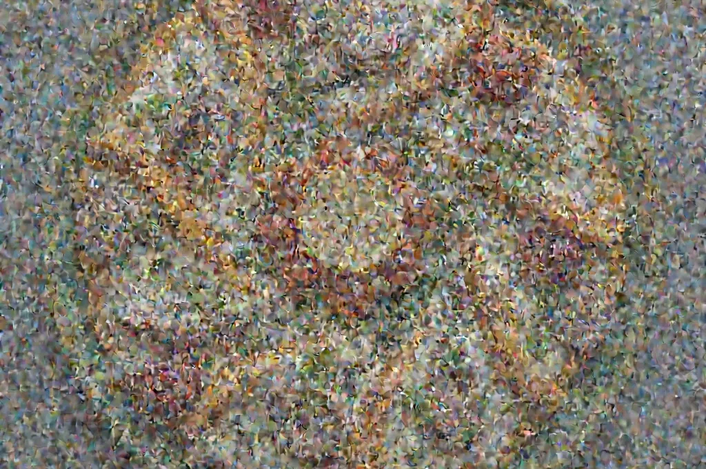 Vista lateral de lienzo mostrando capas de óleo con grietas por mala aplicación de la regla graso sobre magro